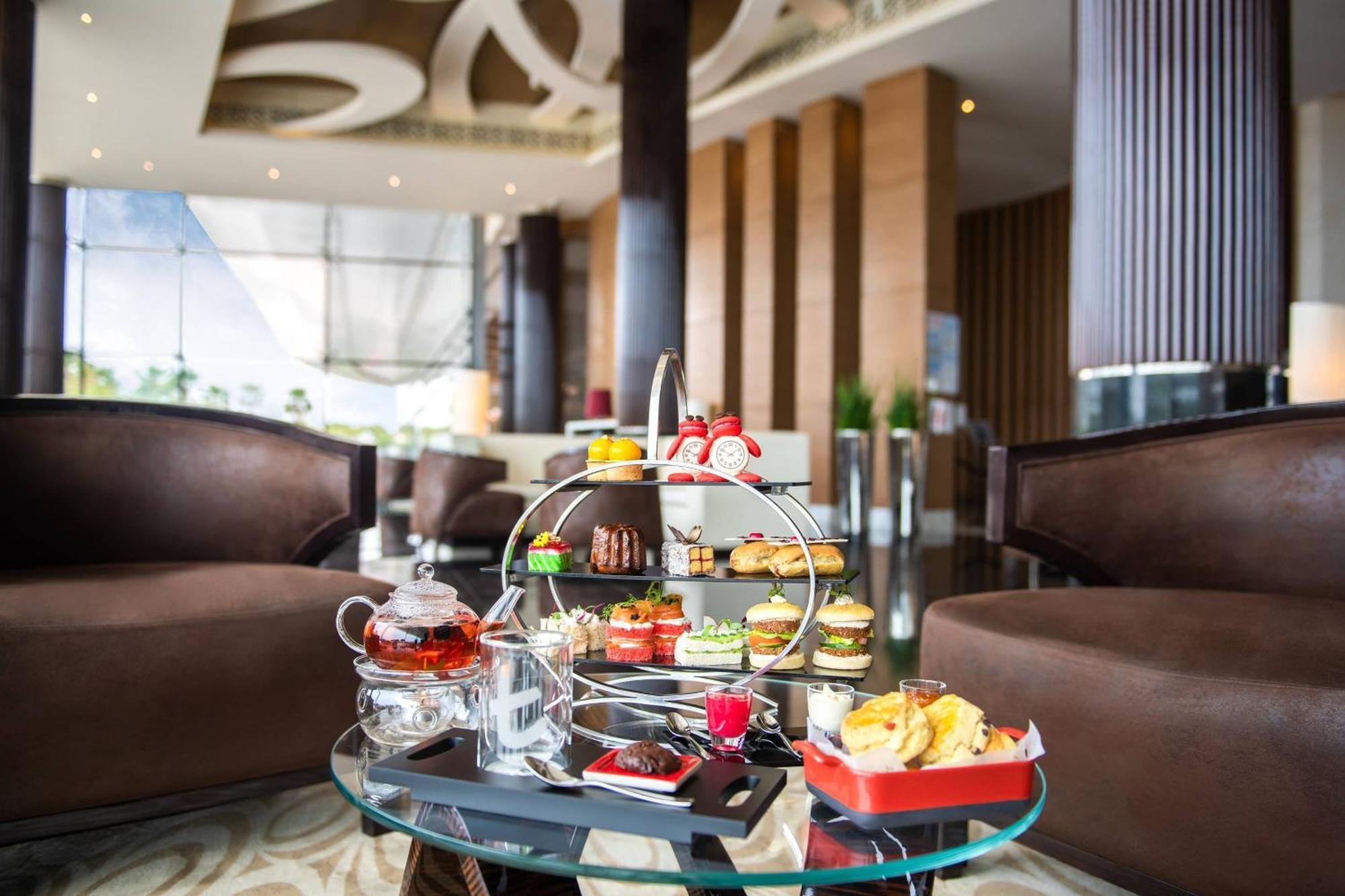 Marriott Hotel Al Forsan, Abou Dabi Extérieur photo Afternoon tea at the Park Hyatt, Hyderabad
